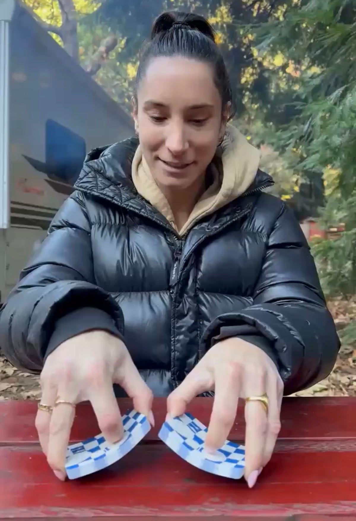 Hands dealing CANDID cards